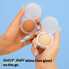 Two hands holding two shades of Mini Cloud Set Setting Powder