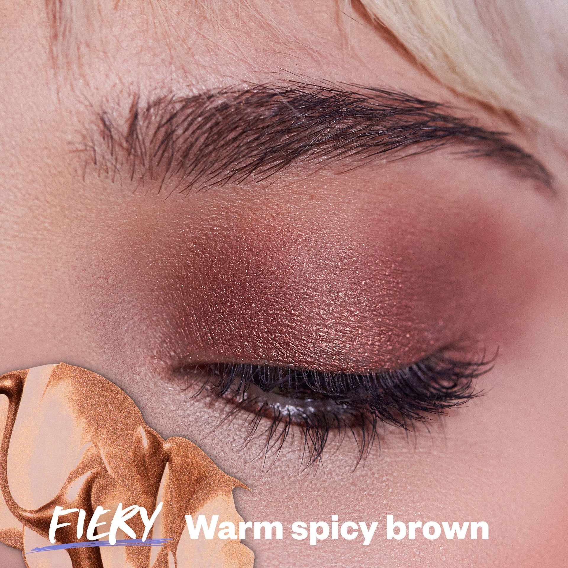 Close-up image of Kosas Eyeshadow Gel in the shade 'Fiery' when applied.