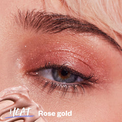 Close-up image of Kosas Eyeshadow Gel in the shade 'Heat' when applied.