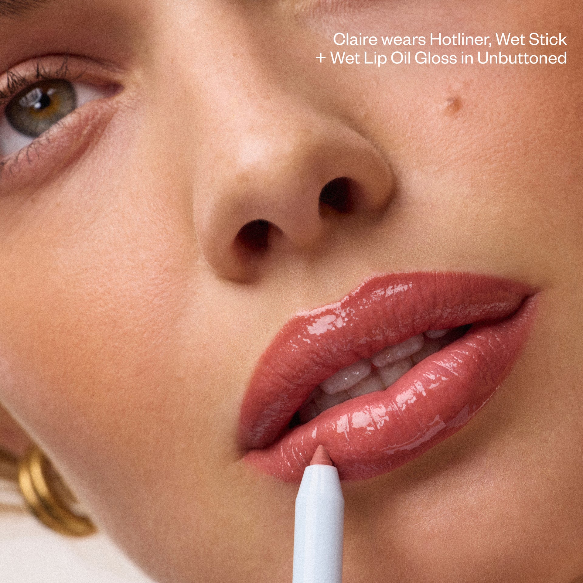 Claire wears Hotliner, Wet Stick + Wet Lip Oil Gloss in Unbuttoned