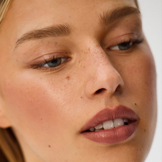 Light skin tone model wearing Impressionist Multistick in Nuance