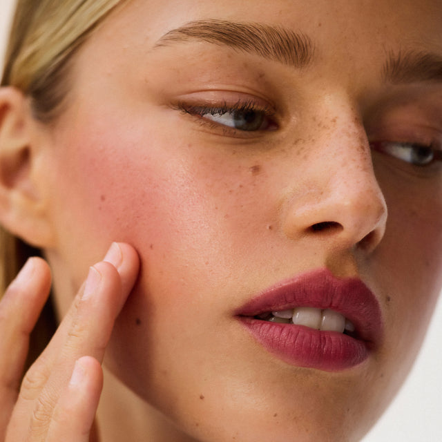Light skin tone model wearing Impressionist Multistick in Ripe