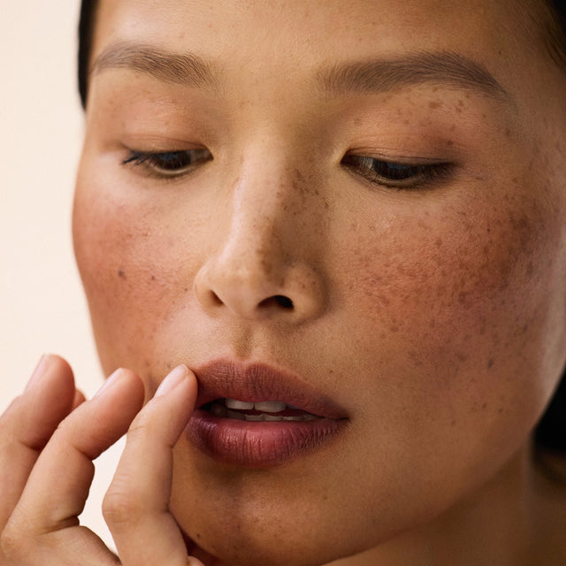 Medium skin tone model wearing Impressionist Multistick in Surreal