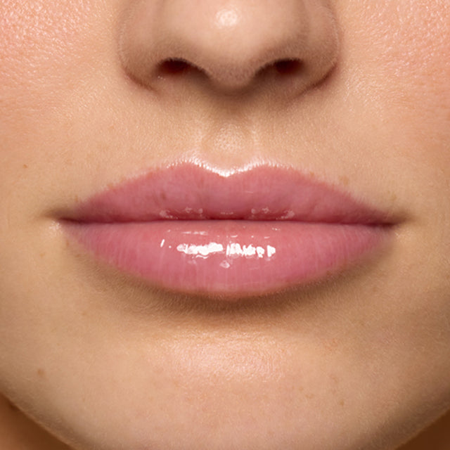 Light skin tone model wearing Lip Pulse in Aftershock