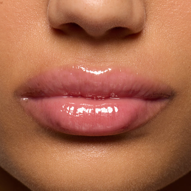 Medium skin tone model wearing Lip Pulse in Aftershock