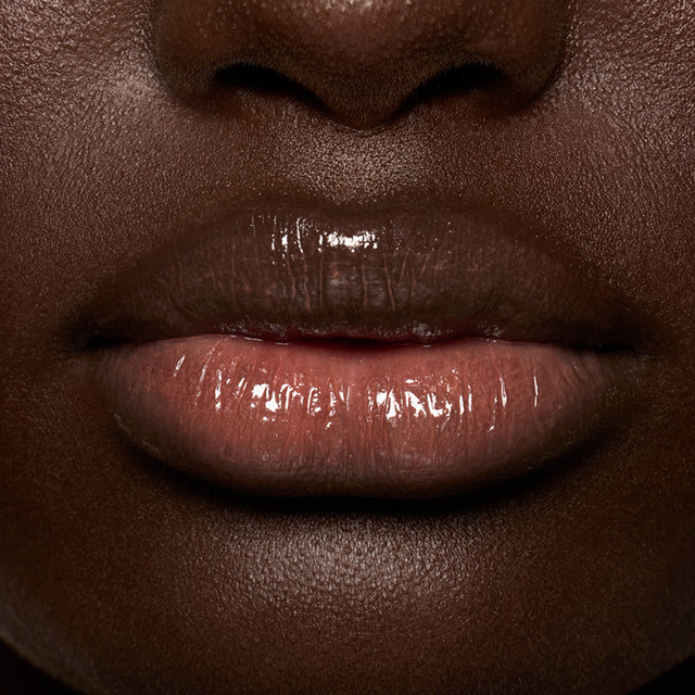 Deep skin tone model wearing Lip Pulse in Sixth Sense